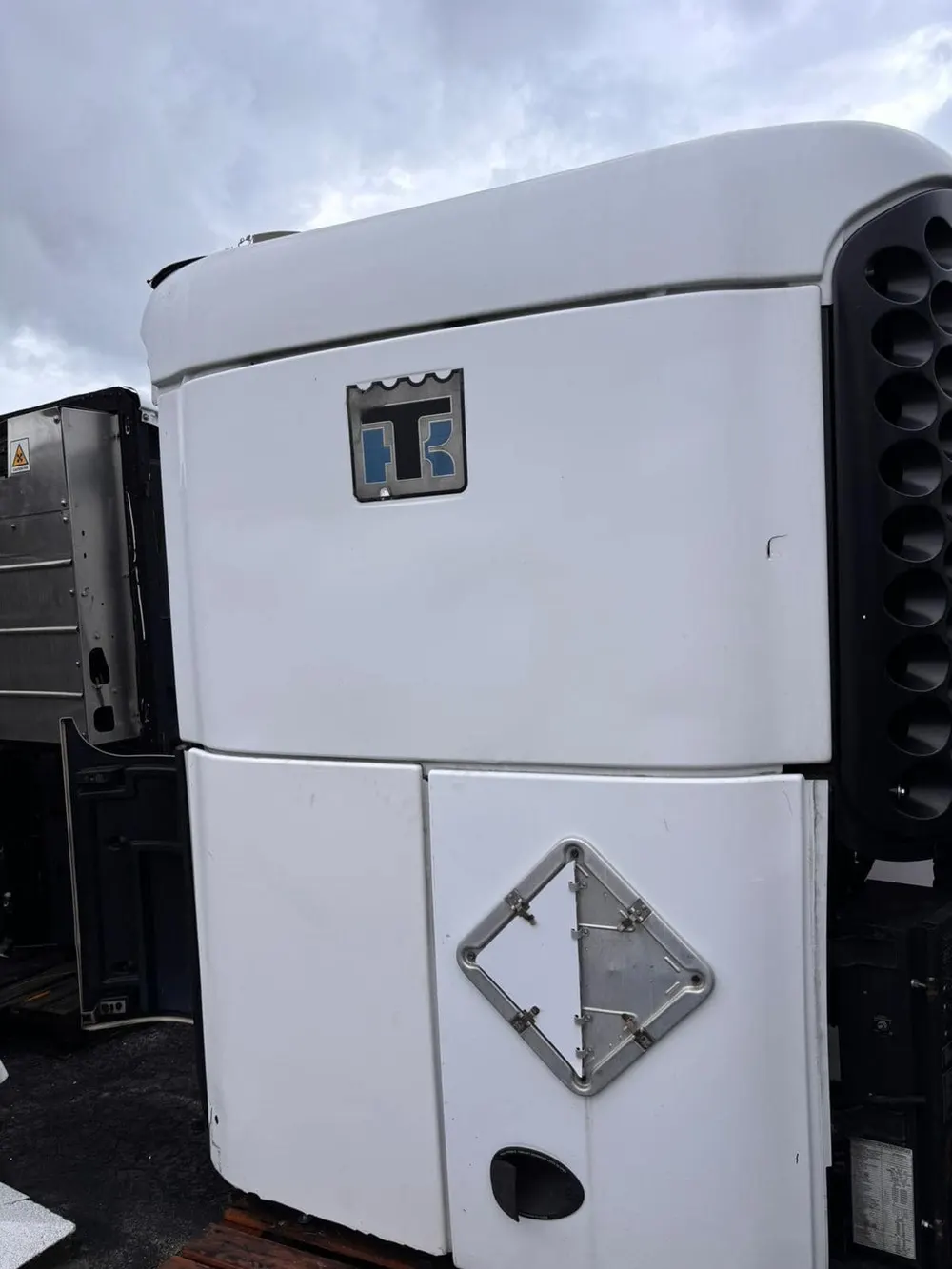 Thermo King SB-110+ trailer refrigeration unit mounted on a reefer trailer nose wall - view 7